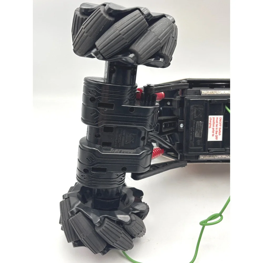 New Bright Slide Winder 4x4 RC Monster Truck Black Red Gold Roll Cage Toy